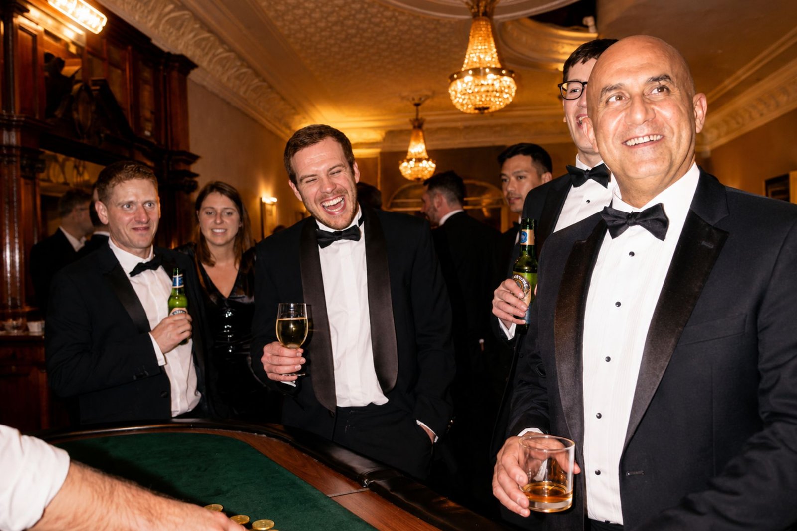 Close-up magician entertaining guests at a London corporate Christmas party